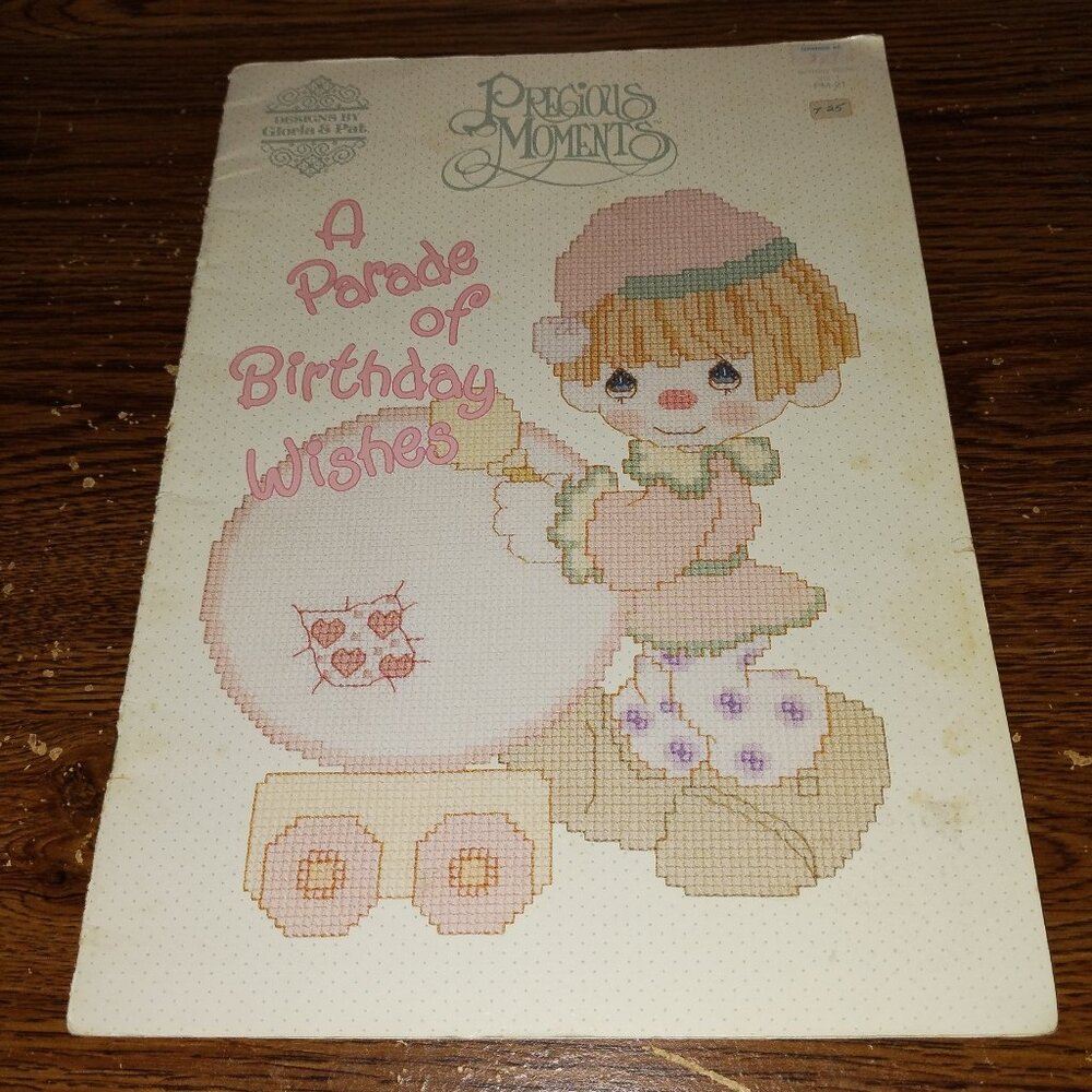 Precious Moments Cross Stitch A Parade of Birthday Wishes (Gloria & Pat, 1989)